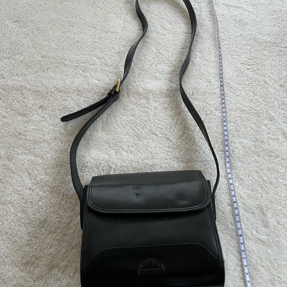 Perry Ellis black leather shoulder bag.